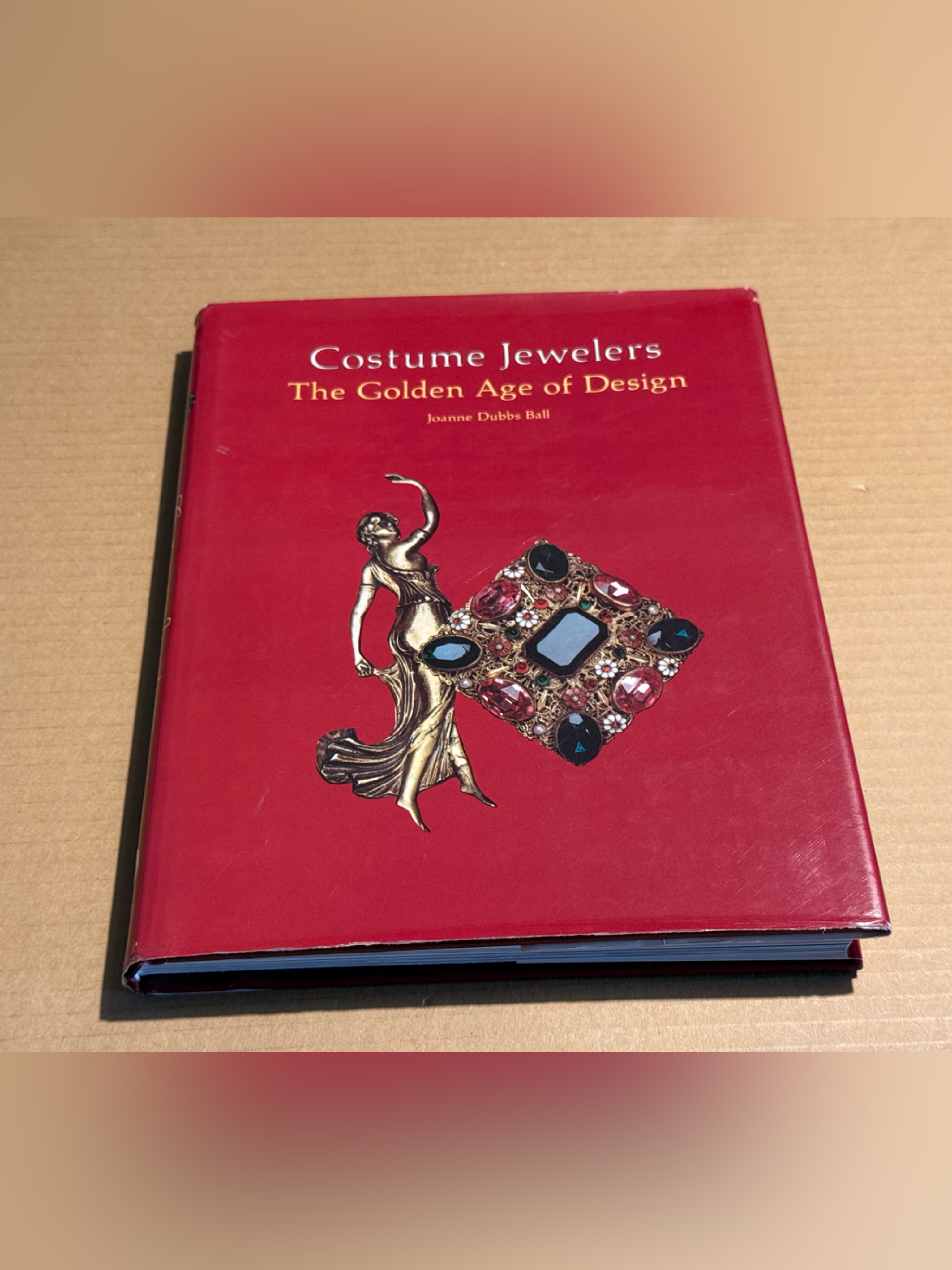 Costume Jewelers: The Golden Age Of Design - Red Hardcover Book